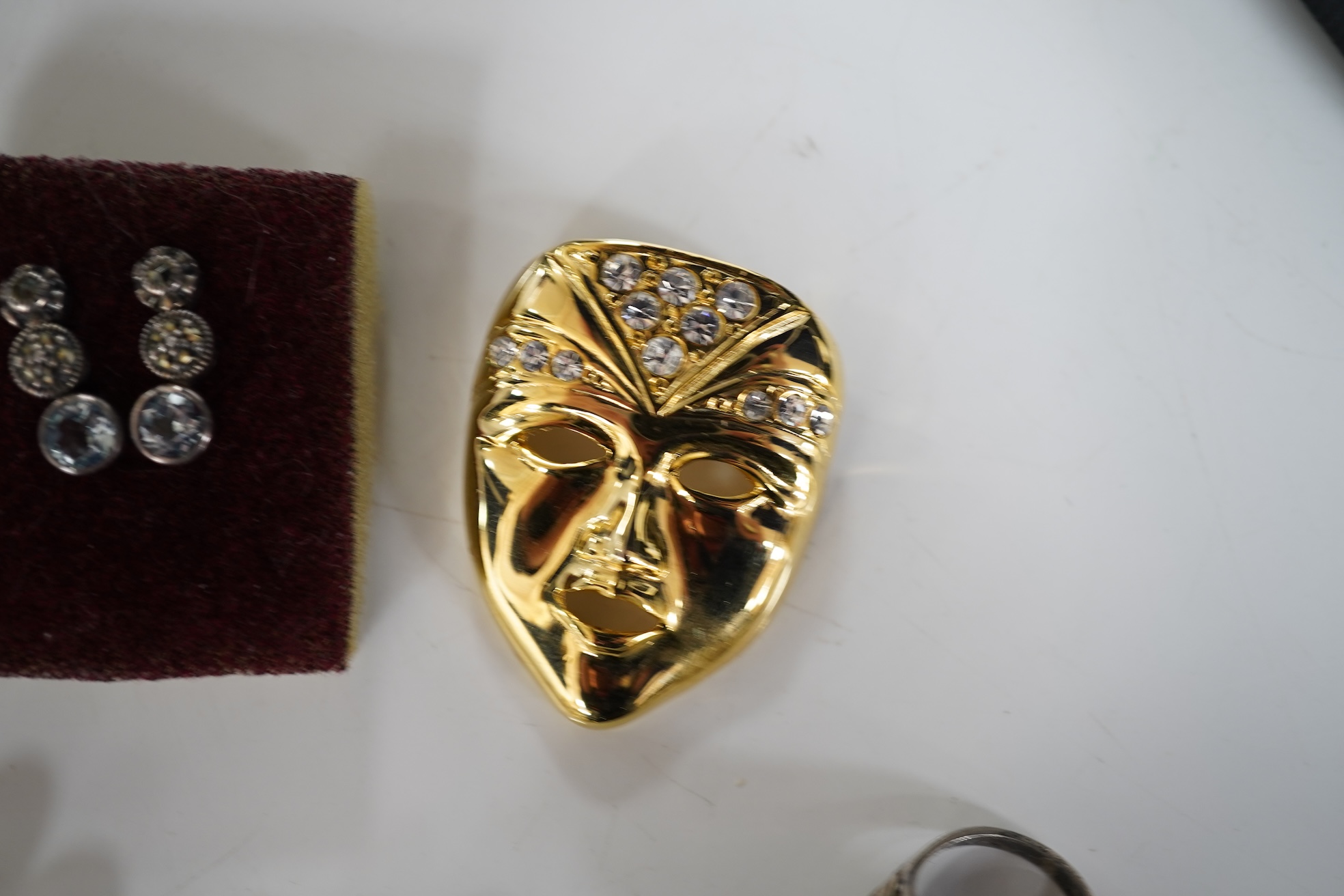 A collection of jewels, comprising: an opal and sapphire cluster ring and a citrine ring in 9ct gold, each with British hallmarks, combined gross weight approximately 4 grams; together with a pair of blue topaz and marca